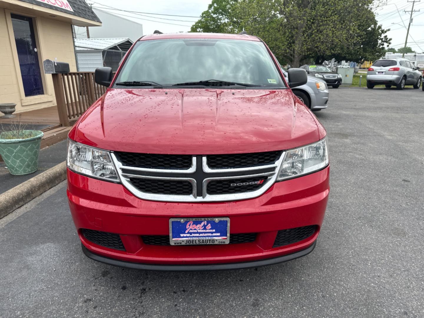 2012 Red /black Dodge Journey SE (3C4PDCAB8CT) with an 2.4L L4 DOHC 16V engine, 4-Speed Automatic transmission, located at 5700 Curlew Drive, Norfolk, VA, 23502, (757) 455-6330, 36.841885, -76.209412 - Photo#5